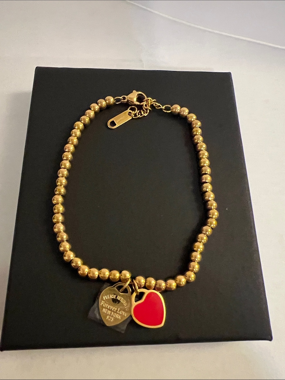 Gold Beaded Bracelet with Red Heart Charm